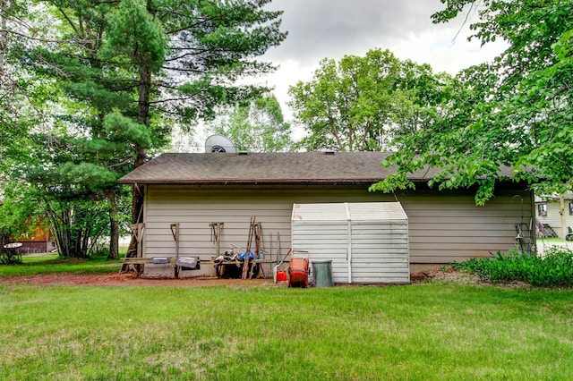 14070 County 18, Park Rapids, MN 56470 - rear view of house with a yard and roof with shingles