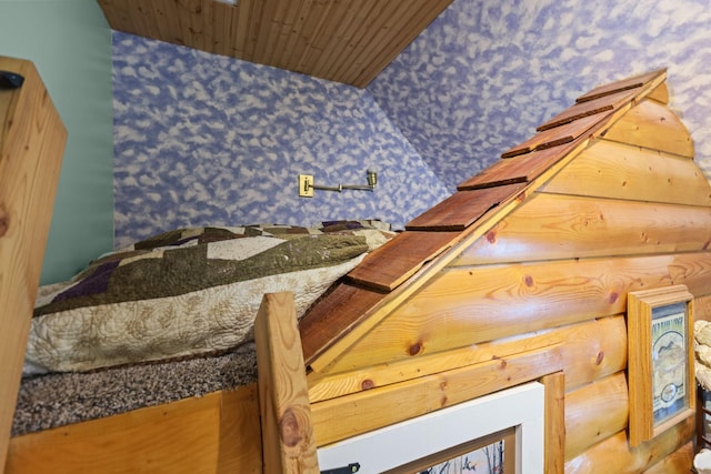 35301 Lily St NW, Springvale Twp, MN 55008 - stairway with wallpapered walls and wood ceiling