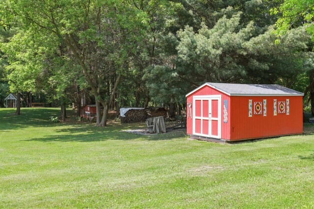 35301 Lily St NW, Springvale Twp, MN 55008 - view of shed featuring view of scattered trees