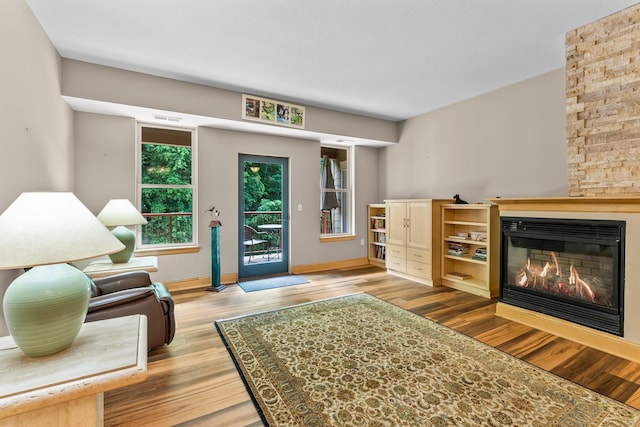 620 Main St N Unit 412, Stillwater, MN 55082 - entrance foyer with a multi sided fireplace and wood finished floors