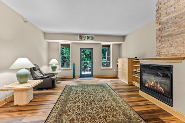 620 Main St N Unit 412, Stillwater, MN 55082 - living area with a glass covered fireplace and wood finished floors