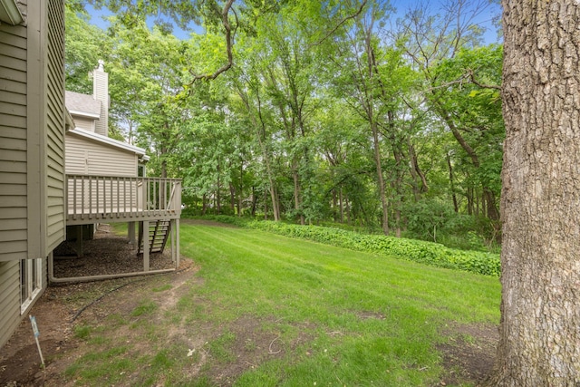 7813 111th St, Bloomington, MN 55438 - view of green lawn with a deck
