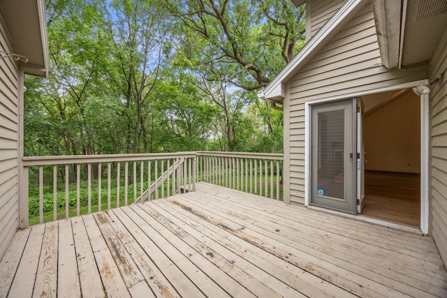 7813 111th St, Bloomington, MN 55438 - wooden deck featuring view of wooded area