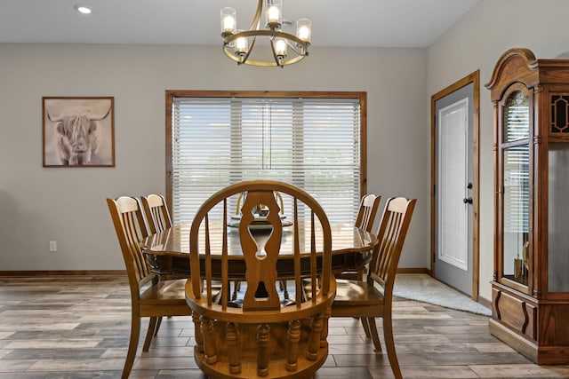 5855 281st Ave NW, Spencer Brook Twp, MN 55040 - dining room featuring a chandelier, wood finished floors, and recessed lighting
