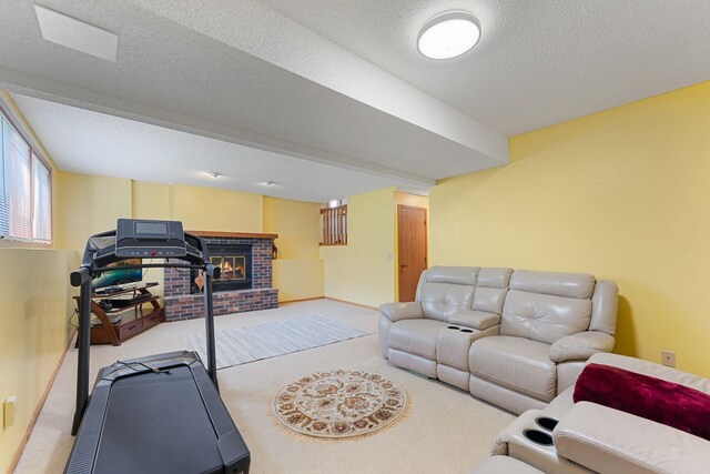 4427 Chatsworth St N, Shoreview, MN 55126 - exercise room with carpet, a brick fireplace, and a textured ceiling