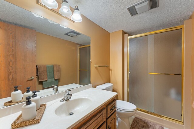 4427 Chatsworth St N, Shoreview, MN 55126 - full bath with toilet, a shower stall, vanity, and a textured ceiling