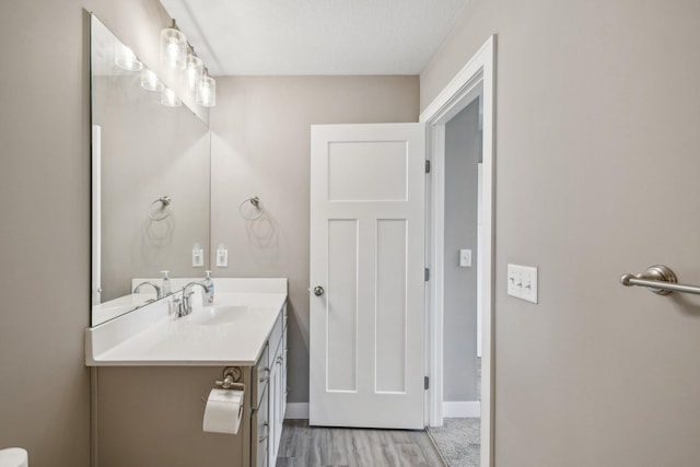 1019 188th St, Garfield Twp, WI 54009 - bathroom featuring vanity and wood finished floors