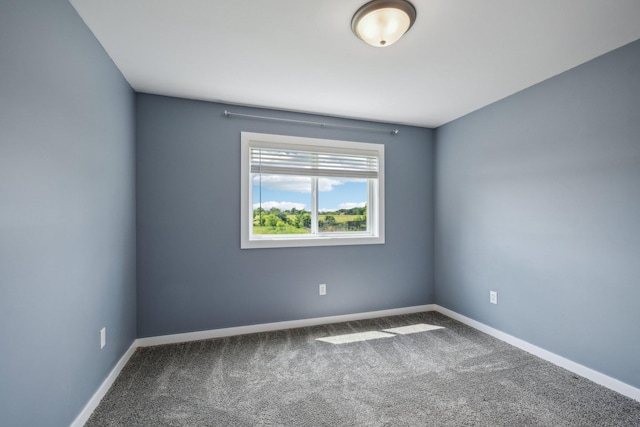 1019 188th St, Garfield Twp, WI 54009 - carpeted spare room featuring baseboards