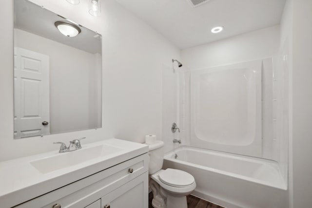 1019 188th St, Garfield Twp, WI 54009 - bathroom with vanity, shower / tub combination, and wood finished floors