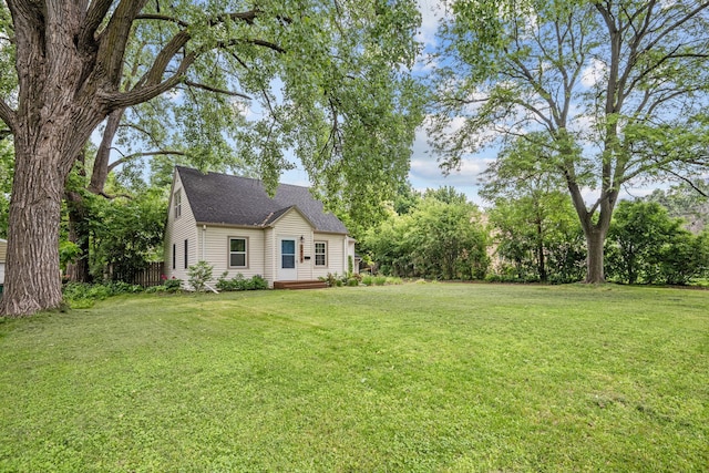 5814 Ewing Ave N, Brooklyn Center, MN 55429 - view of green lawn featuring a wooden deck