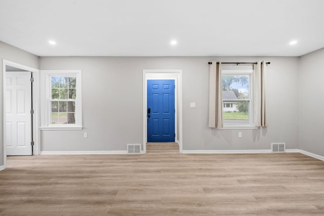 5814 Ewing Ave N, Brooklyn Center, MN 55429 - entryway featuring healthy amount of natural light, light wood-style flooring, and recessed lighting