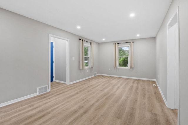 5814 Ewing Ave N, Brooklyn Center, MN 55429 - empty room featuring light wood finished floors and recessed lighting
