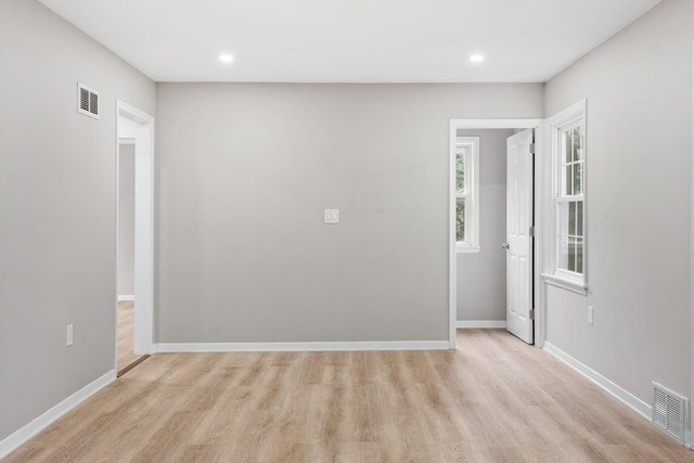 5814 Ewing Ave N, Brooklyn Center, MN 55429 - spare room with light wood-style flooring and recessed lighting