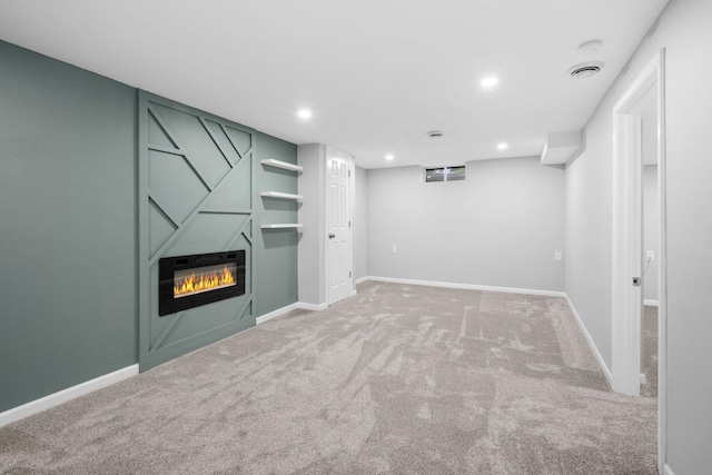 5814 Ewing Ave N, Brooklyn Center, MN 55429 - finished below grade area featuring carpet flooring, recessed lighting, and a large fireplace