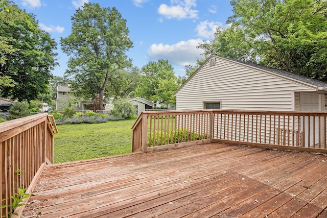 5814 Ewing Ave N, Brooklyn Center, MN 55429 - wooden terrace featuring a lawn