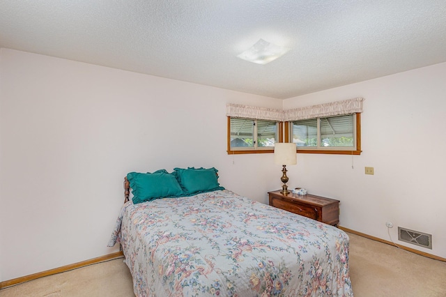 2165 Ross Ave E, Saint Paul, MN 55119 - carpeted bedroom featuring baseboards and a textured ceiling