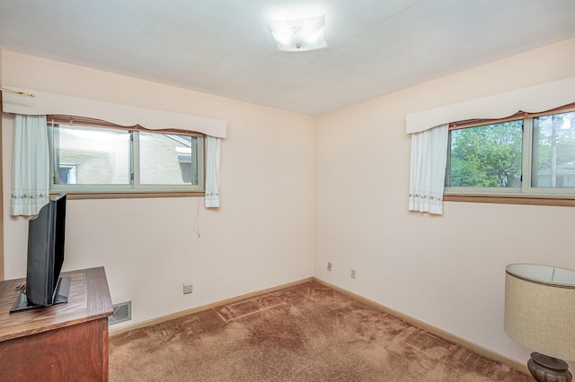 2165 Ross Ave E, Saint Paul, MN 55119 - carpeted empty room with healthy amount of natural light and baseboards