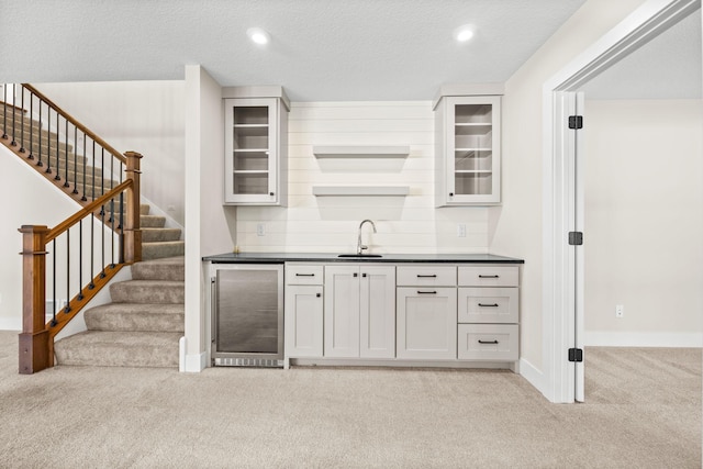 2995 86th St SE, Delano, MN 55328 - bar area featuring wine cooler, light carpet, stairs, tasteful backsplash, and recessed lighting