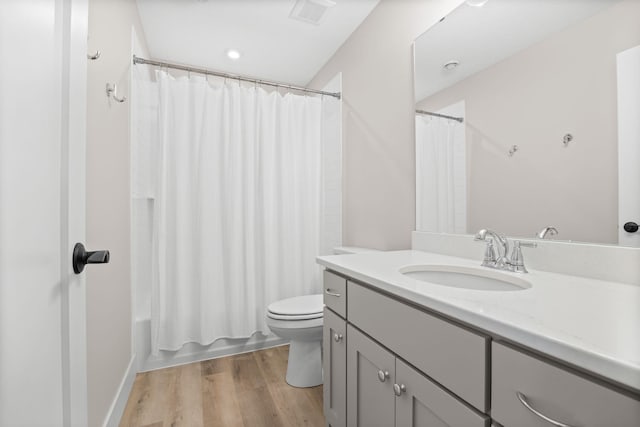 2995 86th St SE, Delano, MN 55328 - bathroom with vanity, wood finished floors, and shower / tub combo