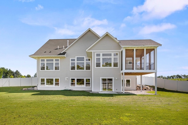 2995 86th St SE, Delano, MN 55328 - rear view of house with a fenced backyard, a sunroom, and roof with shingles