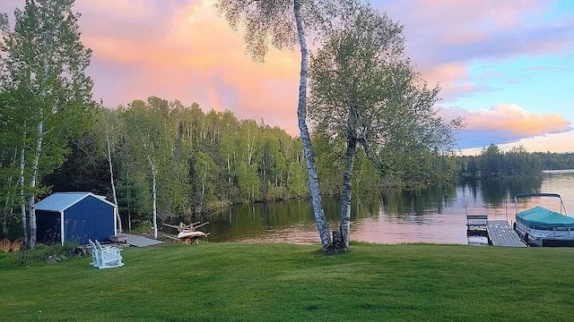 5226 Pontoon Bay Rd, Duluth, MN 55803 - water view with a boat dock and a heavily wooded area