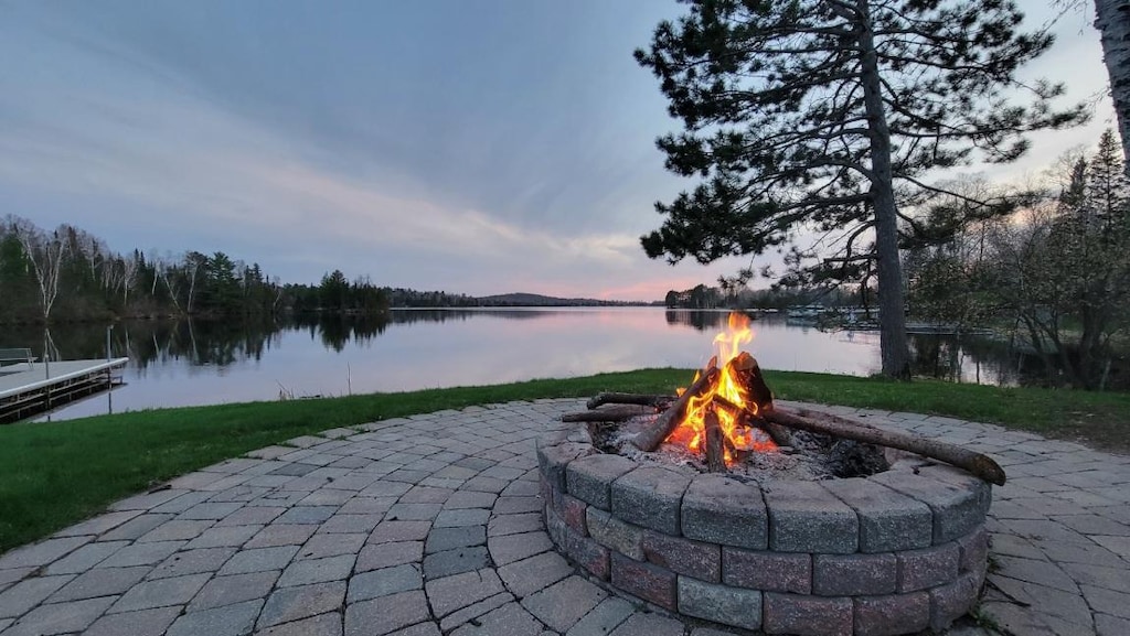 5226 Pontoon Bay Rd, Duluth, MN 55803 - view of patio featuring a fire pit and a water view