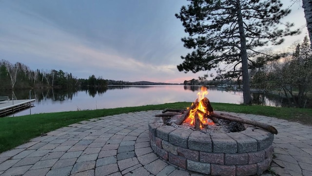 5226 Pontoon Bay Rd, Duluth, MN 55803 - view of patio featuring a fire pit and a water view