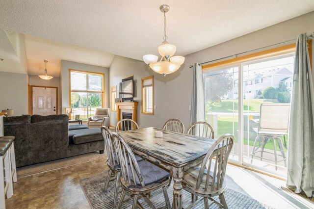 14754 Peridot St NW, Ramsey, MN 55303 - dining space featuring vaulted ceiling
