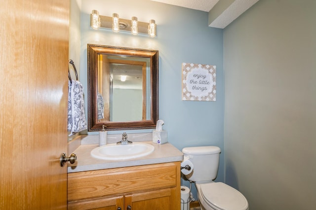 14754 Peridot St NW, Ramsey, MN 55303 - bathroom featuring vanity and toilet