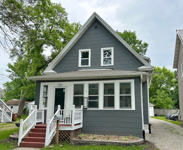803 Jefferson Ave, Albert Lea, MN 56007 - bungalow-style home featuring covered porch and a shingled roof