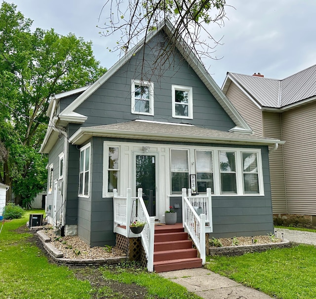 803 Jefferson Ave, Albert Lea, MN 56007 - bungalow-style home with roof with shingles