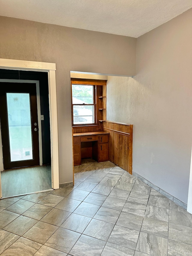 803 Jefferson Ave, Albert Lea, MN 56007 - spare room featuring an office area and baseboards