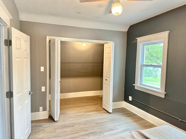 803 Jefferson Ave, Albert Lea, MN 56007 - unfurnished bedroom featuring light wood-style flooring and baseboards