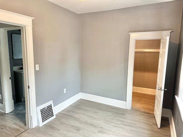 803 Jefferson Ave, Albert Lea, MN 56007 - empty room featuring light wood finished floors and baseboards