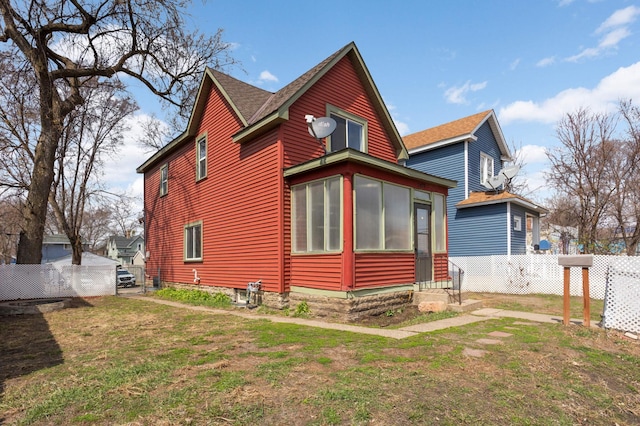 3820 4th Ave S, Minneapolis, MN 55409 - view of side of property with a sunroom
