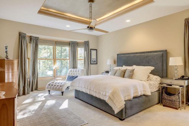 10025 Adam Ave, Inver Grove Heights, MN 55077 - carpeted bedroom featuring a tray ceiling, recessed lighting, and a ceiling fan