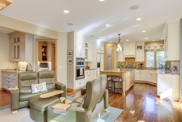 10025 Adam Ave, Inver Grove Heights, MN 55077 - living room featuring dark wood finished floors and recessed lighting