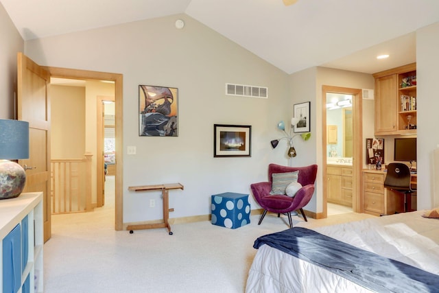 10025 Adam Ave, Inver Grove Heights, MN 55077 - bedroom featuring light carpet, lofted ceiling, connected bathroom, and built in study area