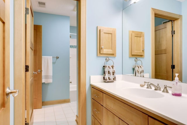 10025 Adam Ave, Inver Grove Heights, MN 55077 - bathroom featuring vanity, bathtub / shower combination, and tile patterned floors
