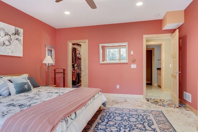 10025 Adam Ave, Inver Grove Heights, MN 55077 - bedroom with a spacious closet, recessed lighting, ceiling fan, and a closet