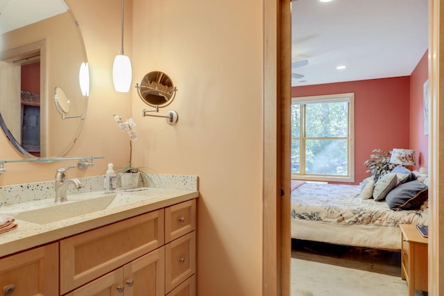 10025 Adam Ave, Inver Grove Heights, MN 55077 - bathroom featuring vanity, connected bathroom, and recessed lighting