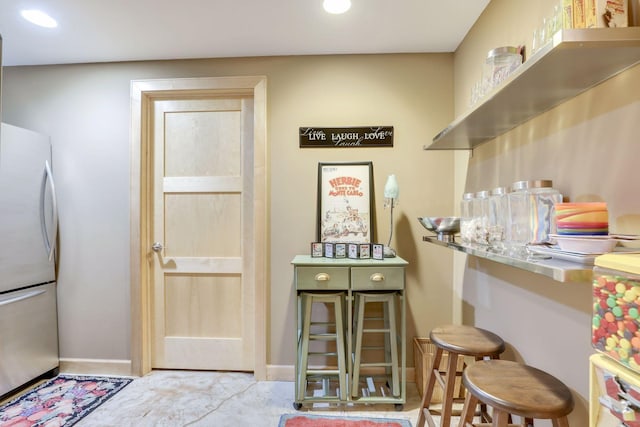 10025 Adam Ave, Inver Grove Heights, MN 55077 - bar featuring freestanding refrigerator and recessed lighting