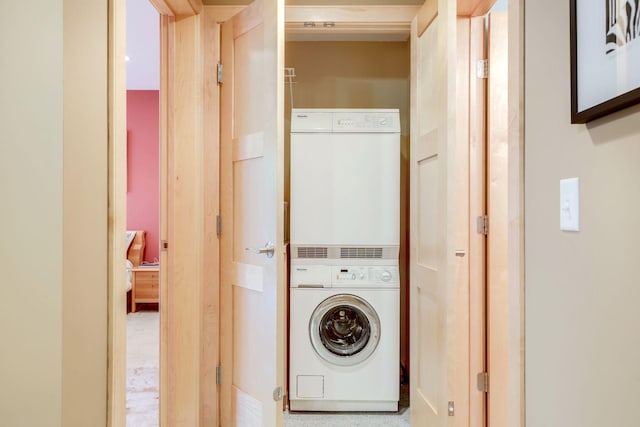 10025 Adam Ave, Inver Grove Heights, MN 55077 - laundry area featuring estacked washer and dryer
