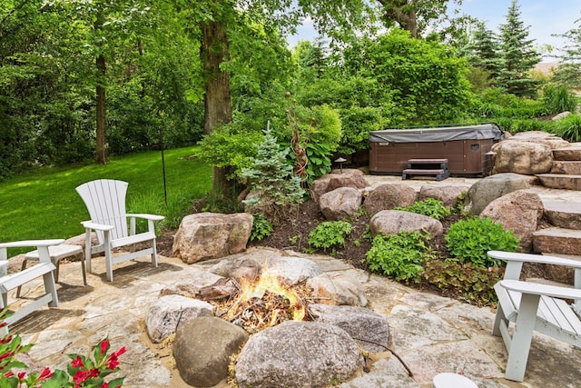 10025 Adam Ave, Inver Grove Heights, MN 55077 - view of patio / terrace with a hot tub and an outdoor fire pit