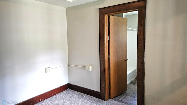 1602 11th St N, Fargo, ND 58102 - carpeted empty room with baseboards
