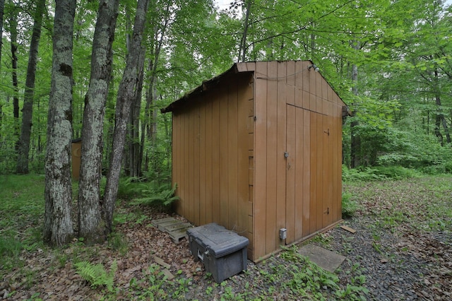 19489 Blue Ln E, Emily, MN 56447 - view of shed featuring a view of trees