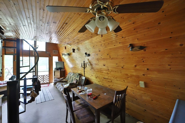 19489 Blue Ln E, Emily, MN 56447 - dining space featuring ceiling fan, wood walls, and wood ceiling