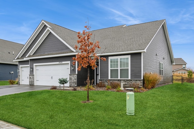 19236 Grass Lake Trl, Rogers, MN 55374 - view of front facade featuring stone siding, driveway, an attached garage, and a shingled roof