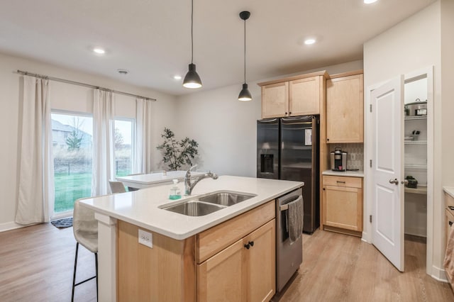 19236 Grass Lake Trl, Rogers, MN 55374 - kitchen featuring a sink, light brown cabinetry, stainless steel dishwasher, light wood-type flooring, and recessed lighting