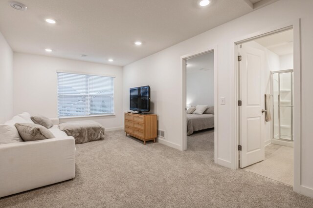 19236 Grass Lake Trl, Rogers, MN 55374 - living room featuring light colored carpet, recessed lighting, and baseboards